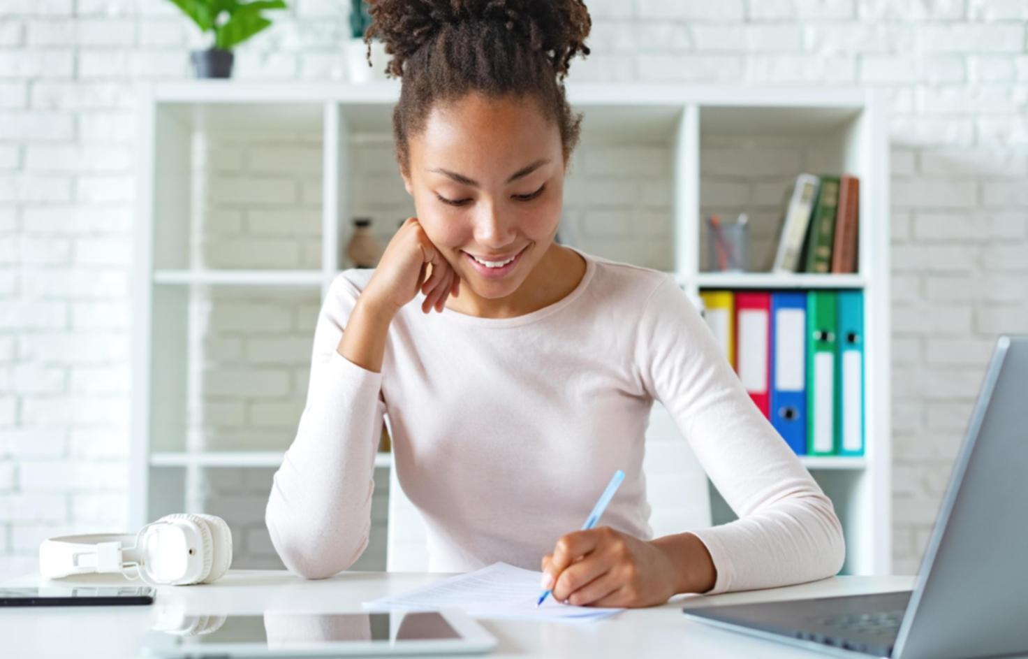 Business owner reviewing financial documents and planning growth strategies